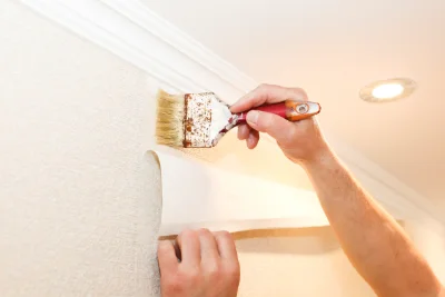Pose de papier peint à Charmensac — revêtements muraux et toiles de verre
